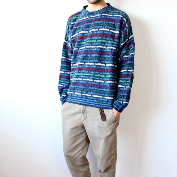white sweater with red and blue stripes