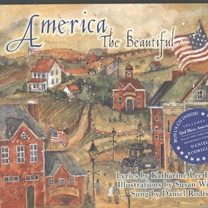 May include: A CD case with the title "America the Beautiful" in a watercolor style. The cover art depicts a quaint American town with red brick buildings, American flags, and a vintage car. Includes a bonus CD with "God Bless America".