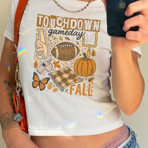 Football Shirt Football Season Baby Tee Football Game Day Coquette Shirt  Preppy Football Baby Tee Girly Fall Football  Tshirt Football Bow