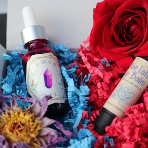 Love Spell Oil + Blue Lotus Lip Balm Kit - Magickal Skin 100% Natural Ingredients | Holistic Cosmetics - Made with Essential Oils & Crystals