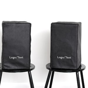 Speaker cover set. Protects equipments from dust and sunburn. Made of soft faux leather with an elegant lining. Set of 2pcs - Black lining