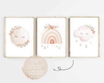 May include: Set of three printable wall art prints featuring a moon, rainbow, and cloud with floral accents. Each design is in a neutral color palette of beige, brown, and peach.