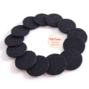 May include: A circle of black felt circles, each measuring 3/4 inch in diameter. The felt circles are laser cut and arranged in a circle. The text "Felt Circles Laser Cuts Black 3/4" is printed on a white label.