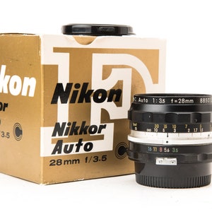 Objetivo Nikon Nikkor-H 28 mm f:3.5 Vintage sin AI con caja original