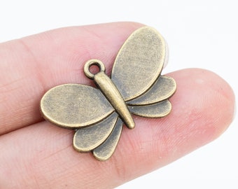 10 Butterfly Charm Antique Bronze Tone  (65019-2528)