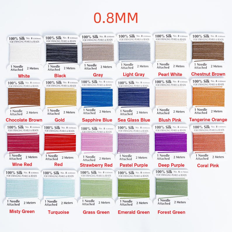 May include: A collection of silk thread spools in various colors, including white, black, gray, and shades of blue, pink, and green. Each spool is labeled with the color name and specifications, including 0.8mm thickness and 2 meters of thread.