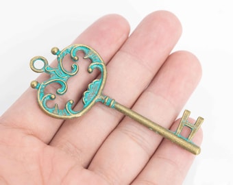 10 Key Charm Double Sided Green Patina Tone (110291-1577)