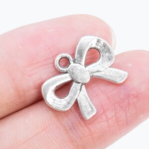 5 Bow Knot Charm Double Side Antique Silver Tone (66479-3365)