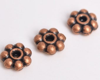 60 cuentas espaciadoras de 6 mm, cuentas de latón con forma de margarita, tono cobre antiguo (64323-2485)