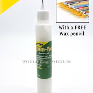 May include: A white 30ml bottle of Beacon Gem-Tac permanent glue, suitable for bonding rhinestones, sequins, and more. Includes a free wax pencil. The label is green and white, with the brand name "BEACON" in yellow.