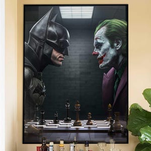 May include: A framed artwork depicting Batman and the Joker facing each other over a chessboard. The Joker is in a purple suit with green hair and white face paint. Batman is in a black suit. The chess pieces are visible on the board. The artwork is displayed above a bar cart.