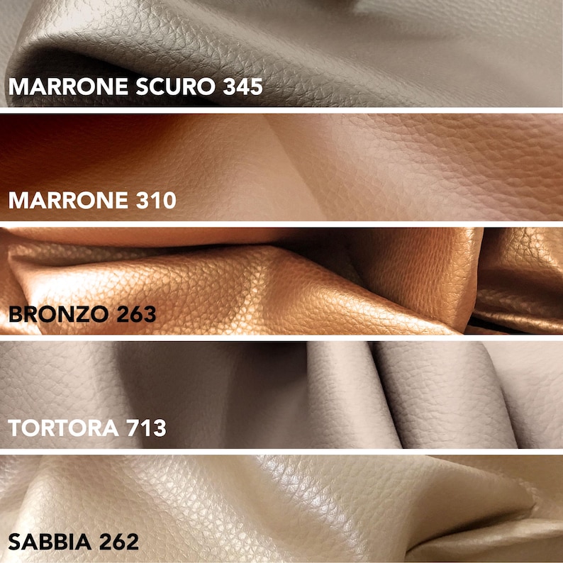 May include: Close-up of five swatches of textured leather in various colors. The colors include dark brown, medium brown, bronze, light gray, and beige. Each swatch has a corresponding name and number printed on it.