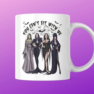 You Can’t Sit With Us / lilly /morticia / vampira / elvira classic monsters - 15 oz Coffee Mug