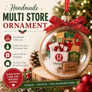 May include: A clear glass Christmas ornament filled with miniature shopping bags from popular retailers like Lululemon, Starbucks, and Amazon. The ornament is decorated with a red ribbon and sits on a wooden base, evoking a festive holiday theme.