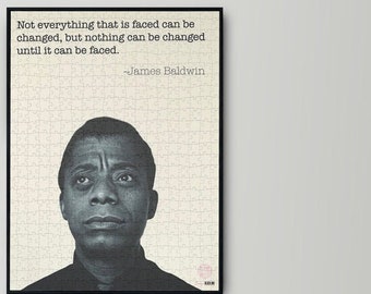 May include: Black and white portrait of James Baldwin with a quote from him: "Not everything that is faced can be changed, but nothing can be changed until it can be faced." -James Baldwin
