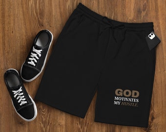 God Motivates My Hustle Men's fleece shorts