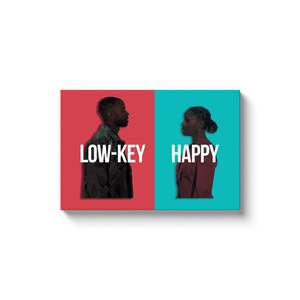 May include: A split image with a man on the left and a woman on the right. The man is on a red background and the woman is on a blue background. The man is looking to the right and the woman is looking to the left. The text "LOW-KEY" is on the left and the text "HAPPY" is on the right.
