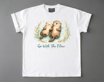 Camiseta de nutria marina: Déjate llevar por la corriente. Camiseta con estampado de acuarela para amantes del océano.