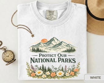 Camiseta con estampado "Protejamos nuestros parques" y diseño "Paisaje botánico de flores silvestres estilo cottagecore".