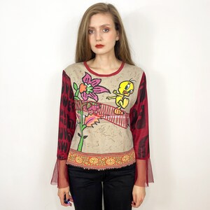Vintage Tshirt von Tshirt mit langen Ärmeln und Stickerei