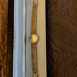 CYMA diamond bezel 14kt gold ladies watch