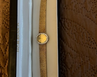 CYMA diamond bezel 14kt gold ladies watch