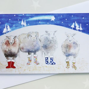 Pecore nella cartolina di Natale di stivali di gomma da un acquerello originale