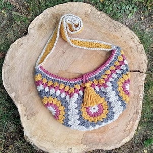 Crochet fanny pack pattern also a crossbody bag or shoulder bag. Single crochet strap with tassel. This Boho Bag pattern features beautiful crochet sunburst motif.