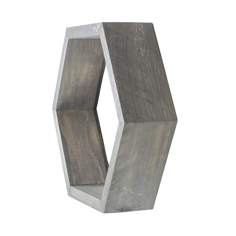 May include: A hexagonal wooden shelf with a grey stain finish. The shelf is empty and ready to display your favourite items.