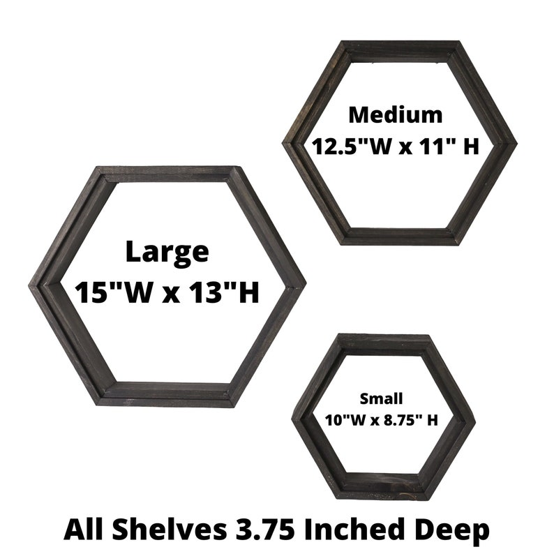 May include: Three wooden hexagonal shelves in different sizes. The shelves are painted black and have the dimensions 15"W x 13"H, 12.5"W x 11"H, and 10"W x 8.75"H. All shelves are 3.75 inches deep.