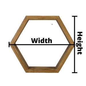 May include: A wooden hexagonal shelf with a natural finish. The shelf is 30 cm wide and 26 cm high.
