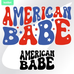 May include: Red, white, and blue graphic text that reads "AMERICAN BABE" in a retro font. The text is repeated in black below.