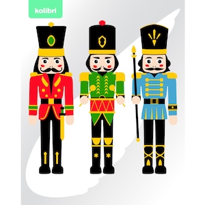 May include: Three colorful nutcracker soldier illustrations. The soldiers are in red, green, and blue uniforms with black hats. Each soldier has a mustache and is holding a staff or sword. The word "kolibri" is in a green rectangle in the top left corner.