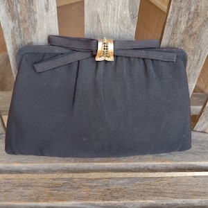 After Five Black Clutch or Top Handle Bag with Ornate Gold Clip and Bow Closure and a Connected Kiss Lock Coin Purse Made in USA
