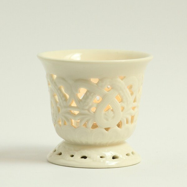 Vintage porcelain tealight holder. Bright white. Filigree. Cut out. Candle. Regal. Circa late 20th century.