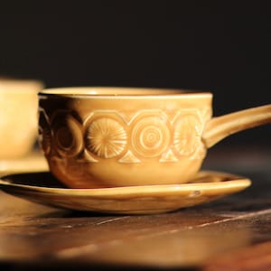 Pair of mid-century mugs. Mustard glaze. Stoneware. Tea/Coffee cups. Matching set of two. Tams, England. Circa 1960s.