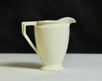 Vintage Futurist milk jug. Burleigh ‘Athlone’. Medium sized. Ivory. Classic 1940s shape. Wide necked. Geometric handle. Neutral. Circa 1940s