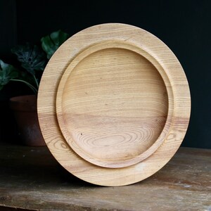 Vintage wooden platter. Hand-turned. Solid wood. Large fruit bowl. Giant serving dish. Functional. Minimalist. Circa 1970s.