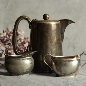Vintage silver-plated tea set: tea pot, milk jug, sugar pot. EPNS. Walker & Hall. Coffee pot. Aged. Patinated. Circa 1940s.