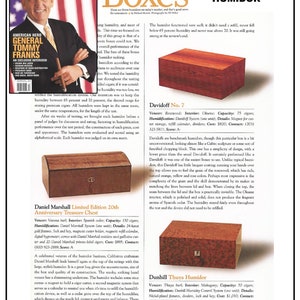 May include: A close-up of a wooden humidor with a dark brown finish. The humidor is labelled "Daniel Marshall" and "The Number 1 Humidor".