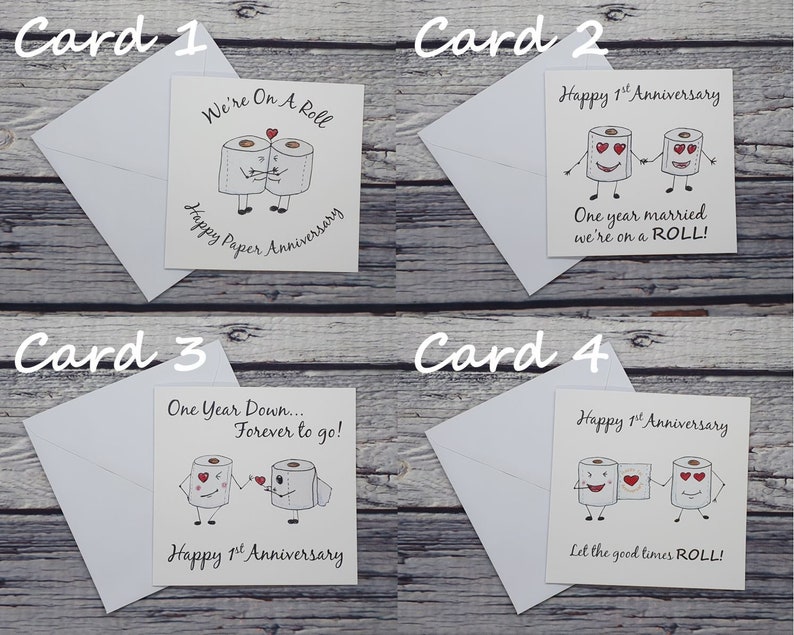 May include: Four greeting cards with a humorous theme featuring cartoon toilet paper rolls with faces and hearts. The cards are for a first anniversary and have different messages, including "We're On A Roll", "One Year Married We're On A Roll", "One Year Down...Forever To Go!" and "Let The Good Times Roll!"