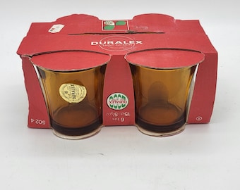 4 vintage Duralex amber glasses in original box