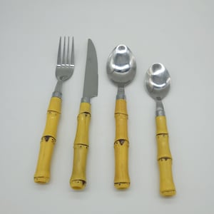 Set of vintage metal and bamboo cutlery knife fork spoons