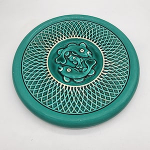 Old vintage fish ceramic trivet