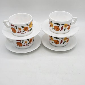 4 vintage Arcopal cups and saucers orange flowers