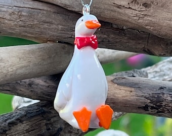 Handmade Clay Christmas Duck wearing a red bow tie (D5)