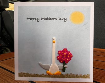 Seagull holding bouquet Mothers Day card with handmade polymer clay decorations.
