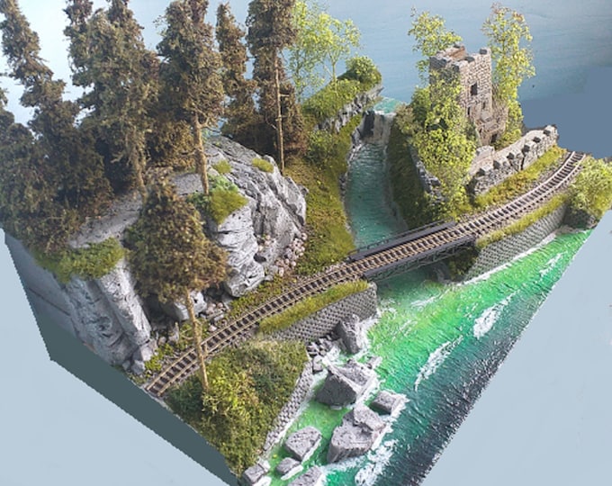 N scale 1/160 railroad Diorama with lake, castle ruin, waterfall, hillside, rocks, and trees