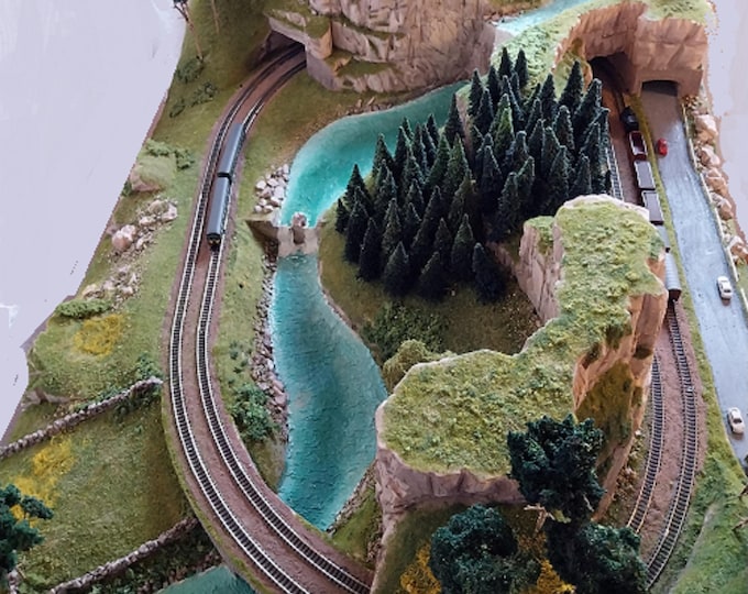 Scenic landscape double track model railway layout on a base of 120 x 90 cms
