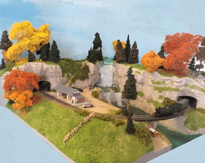 Realistic scenic model train railway layout made to order in HO scale 1/87, or N scale 1/160.